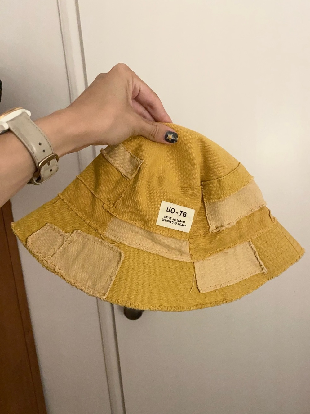 Urban Outfitters yellow patchwork bucket hat